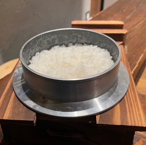 Freshly cooked rice in a kiln