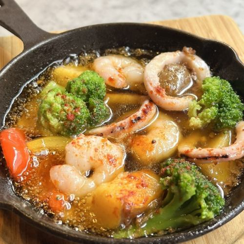 Shrimp, squid and seasonal vegetable ajillo