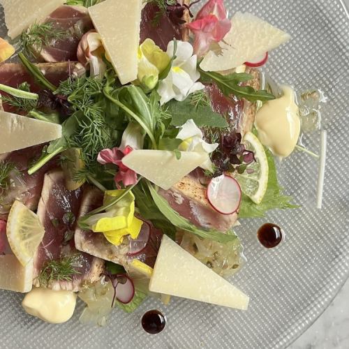 Seared Makurazaki bonito with arugula and Grana Padano