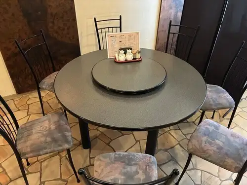 A lively party around a large round table!
