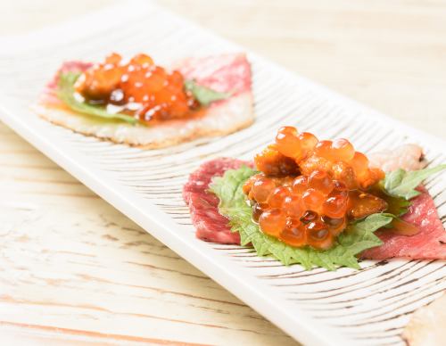 SANGO的特色菜通力海膽鮭魚子卷