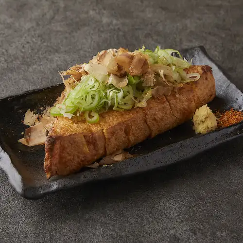 charcoal-grilled triangular fried tofu