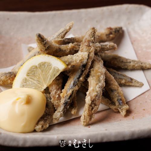 Deep fried silver-striped round herring