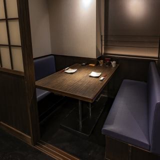 This is a private table seating area that can accommodate 2 to 3 people.