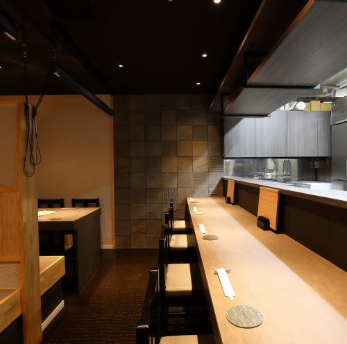 There are 6 seats at the counter where you can see the kitchen.