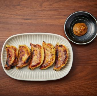 Green chili miso dumplings