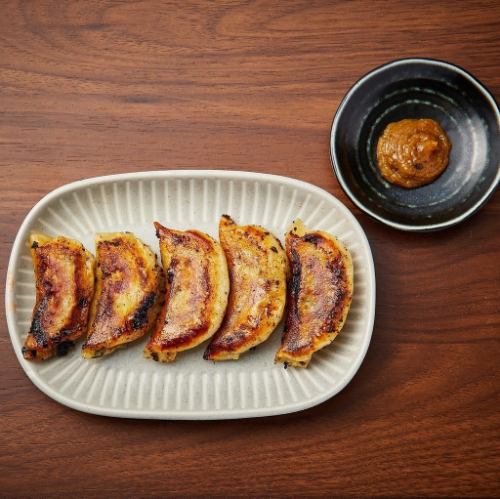 Green chili miso dumplings