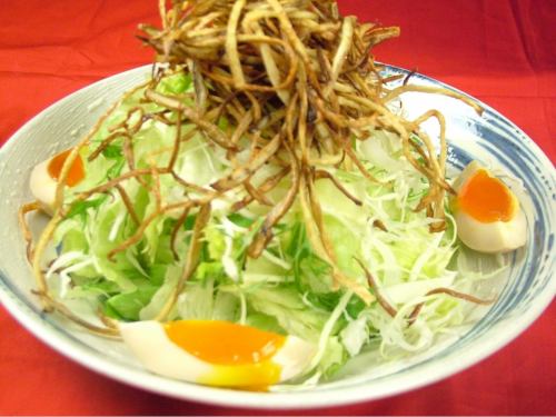 Soft-boiled egg and crunchy salad / seafood salad
