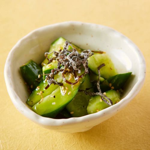 Seared cucumber drizzled with green onion salt