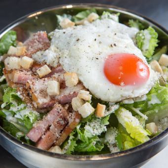 Caesar salad with charcoal grilled bacon half