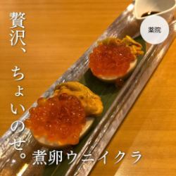 Sea urchin and salmon roe on boiled egg