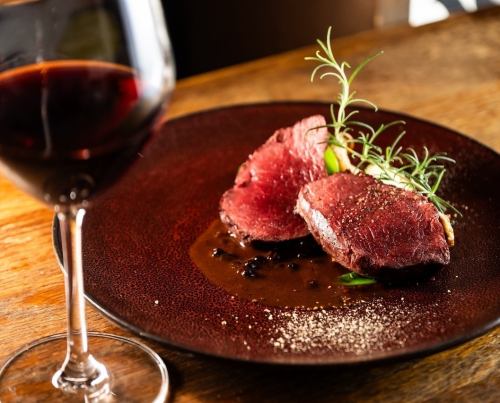 Roasted Ezo venison with forest fruit sauce