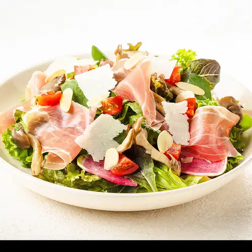 Prosciutto and three kinds of mushroom salad