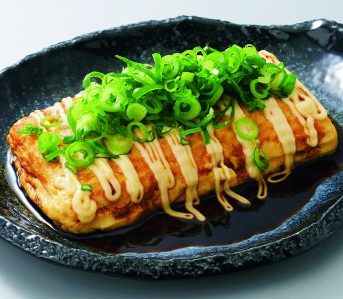 Rolled omelet with lots of green onions and teriyaki mayonnaise