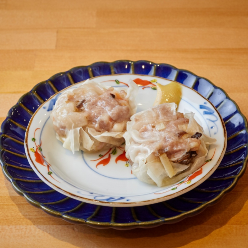 Cantonese style steamed dumplings topped with flying fish roe