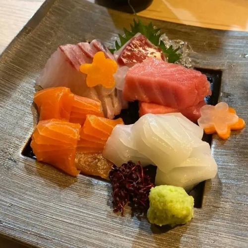 A daily sashimi platter made with fresh fish procured at the market every morning