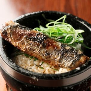 Stone-grilled mixed rice with seasonal fish