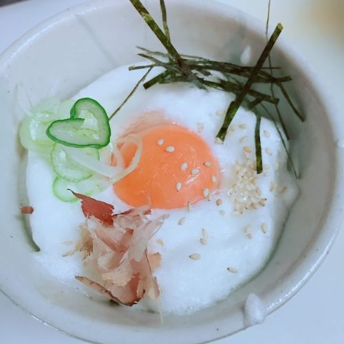 Araucana bird egg over rice
