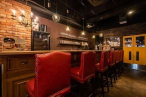 Stylish counter seats with red high chairs