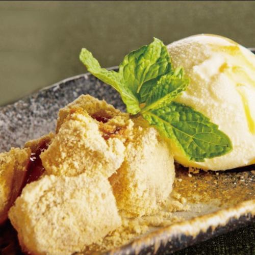 Warabi mochi and vanilla ice cream with brown sugar syrup