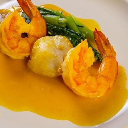 Shrimp and white fish with saffron