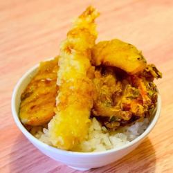 Bowl of rice and fried fish