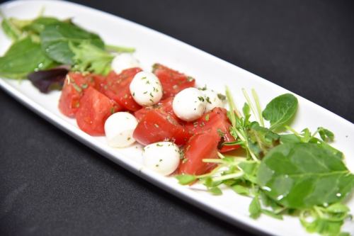 Piccolo mozzarella and fresh tomato salad