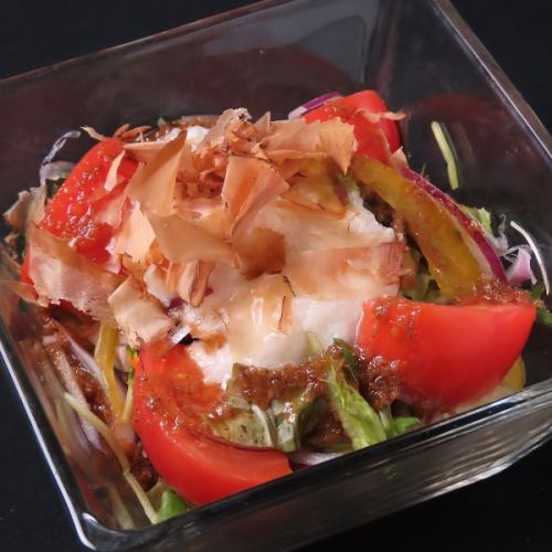 Japanese-style salad with tomatoes and tororo