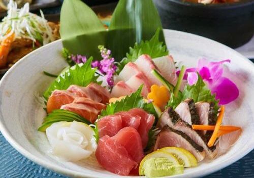 Assortment of four types of sashimi