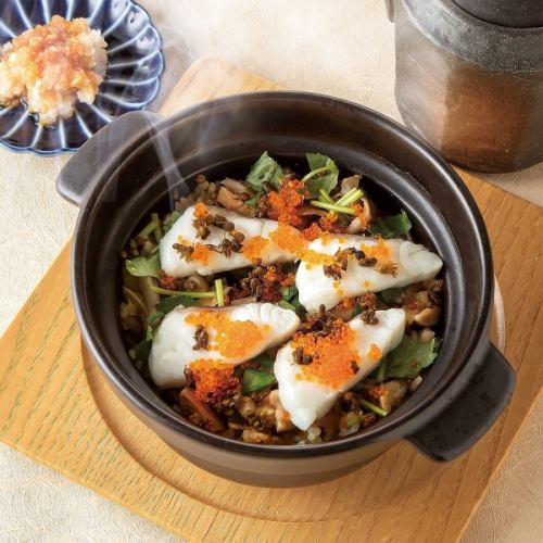 Red sea bream and matsutake mushroom rice cooked in a clay pot with sea bream broth