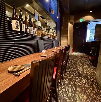 There are counter seats near the entrance to the store.