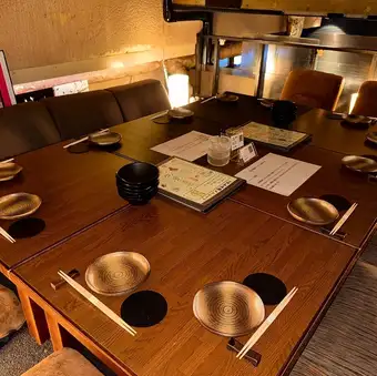 Semi-private seating in the loft on the second floor.4 people x 3 seats/2 people x 1 seat