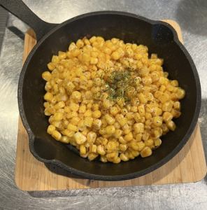 Heaping serving of corn with butter