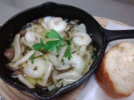 Shrimp and mushroom ajillo served with French bread