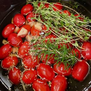 .Homemade tomatoes marinated in rosemary and thyme