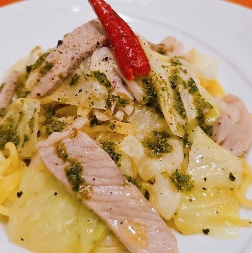 Pork loin and cabbage with basil and anchovy flavored fresh pasta