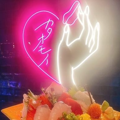 A stylish sushi restaurant with neon lights♪