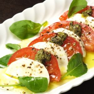 Caprese of ripe tomatoes