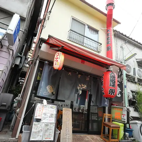 A retro space marked by red lanterns and a chimney.