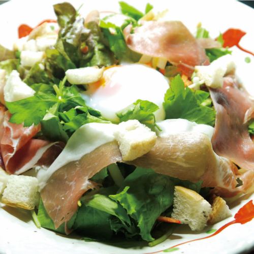 Caesar salad with raw ham and hot spring eggs