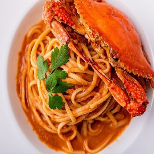 Rich and creamy tomato pasta with blue crab and crab miso