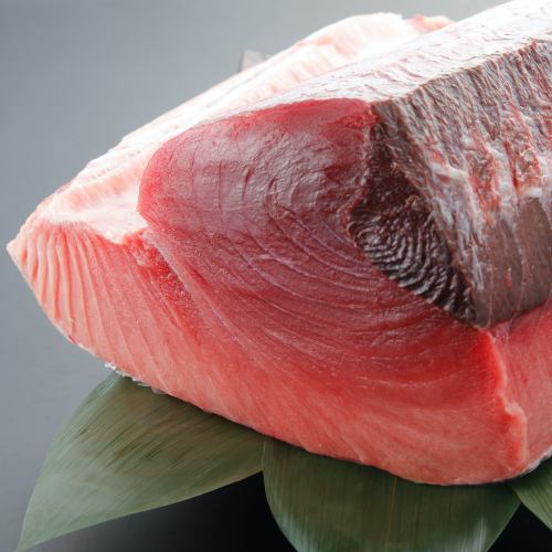 A luxurious sashimi platter featuring fresh fish delivered directly from the market