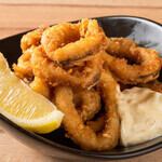 Deep fried squid rings with tartar sauce