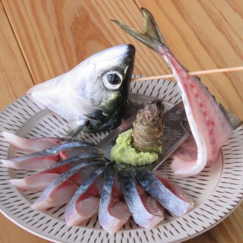 Live fish mackerel ironing