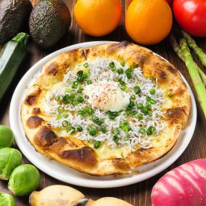 Soft-boiled egg with green onions and whitebait