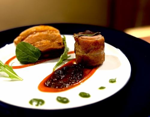 Confit of duck thigh from Aomori prefecture and Kagoshima prefecture black pork stewed in tomato sauce with white kidney beans