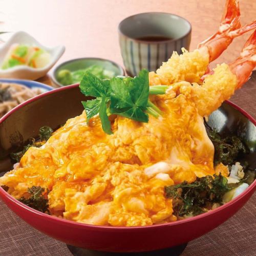 Large shrimp tempura rice bowl with fluffy egg and noodles