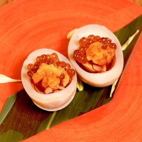 Boiled egg with sea urchin and salmon roe