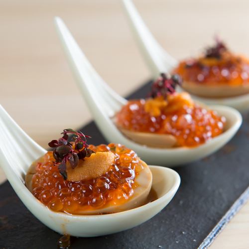 Boiled eggs topped with sea urchin and salmon roe