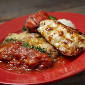 Golden grilled lobster tail and chicken Milanese